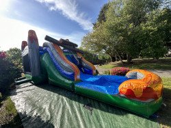 E16161A5 4D9A 4A3B B435 689173C00749 1684889313 Giant Trex bounce house/waterslide 15’Wx14’Hx34’L